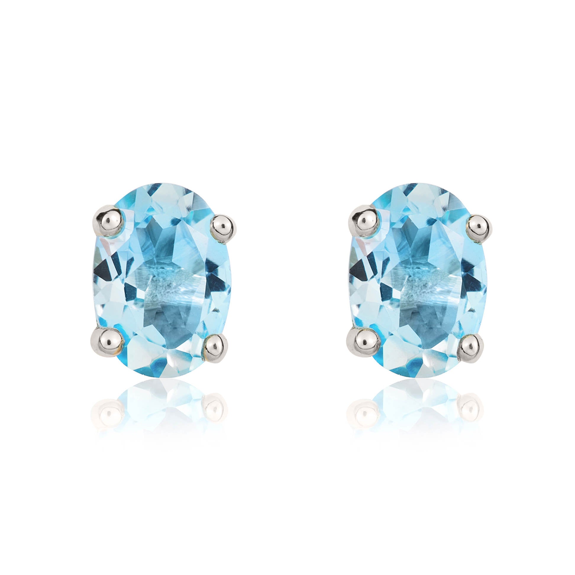 9ct White Gold 7x5mm Oval Swiss Blue Topaz Claw Set Stud Earrings