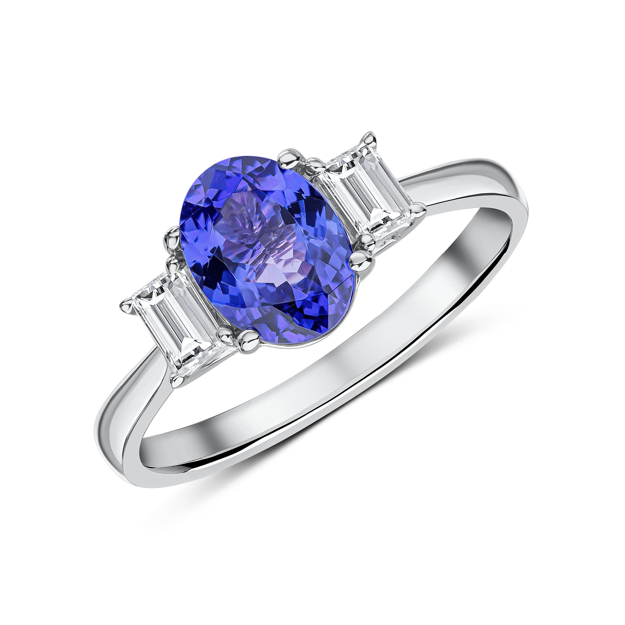 18ct White Gold 8x6 Oval Tanzanite and Baguette Diamond Claw Set 3 Stone Ring