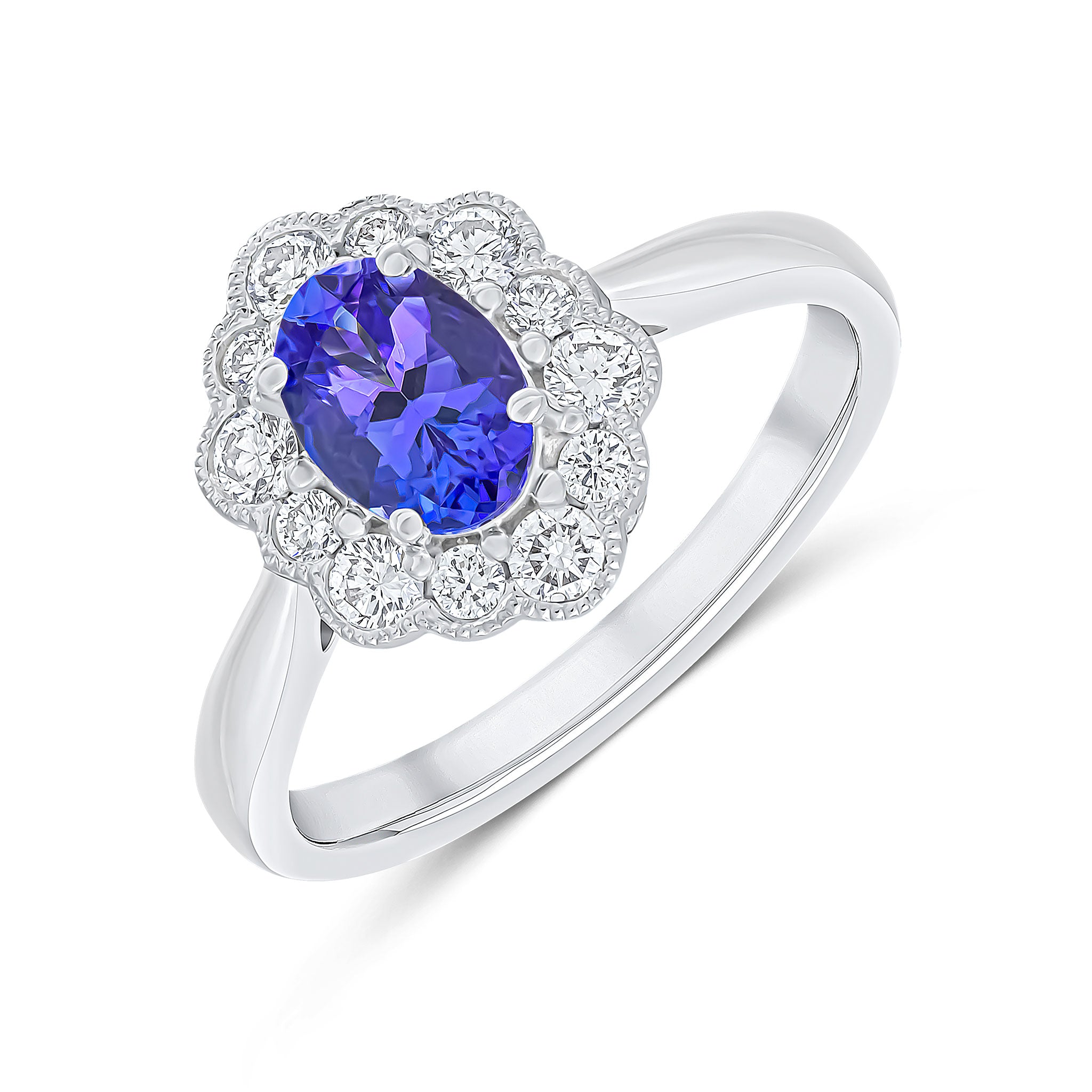 18ct White Gold Claw Set 7x5 Oval Tanzanite and Milgrain Round Diamond Cluster Ring