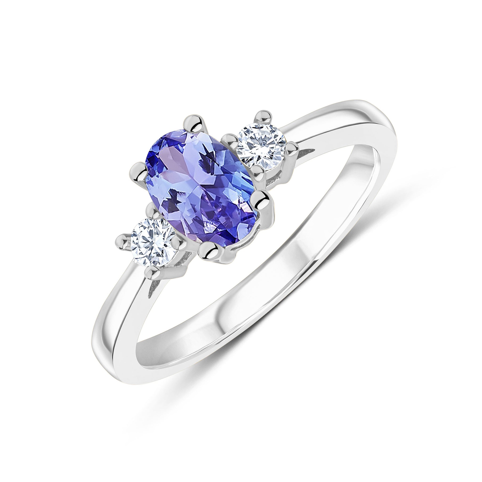 9CT WG 7X5 OVAL TANZANITE AND ROUND DIAMOND CLAW SET 3ST RING 1