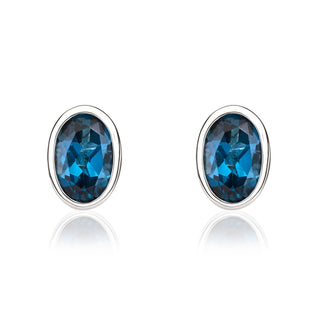 9ct white gold 6 x 4 mm oval London Blue Topaz rubover Stud Earrings