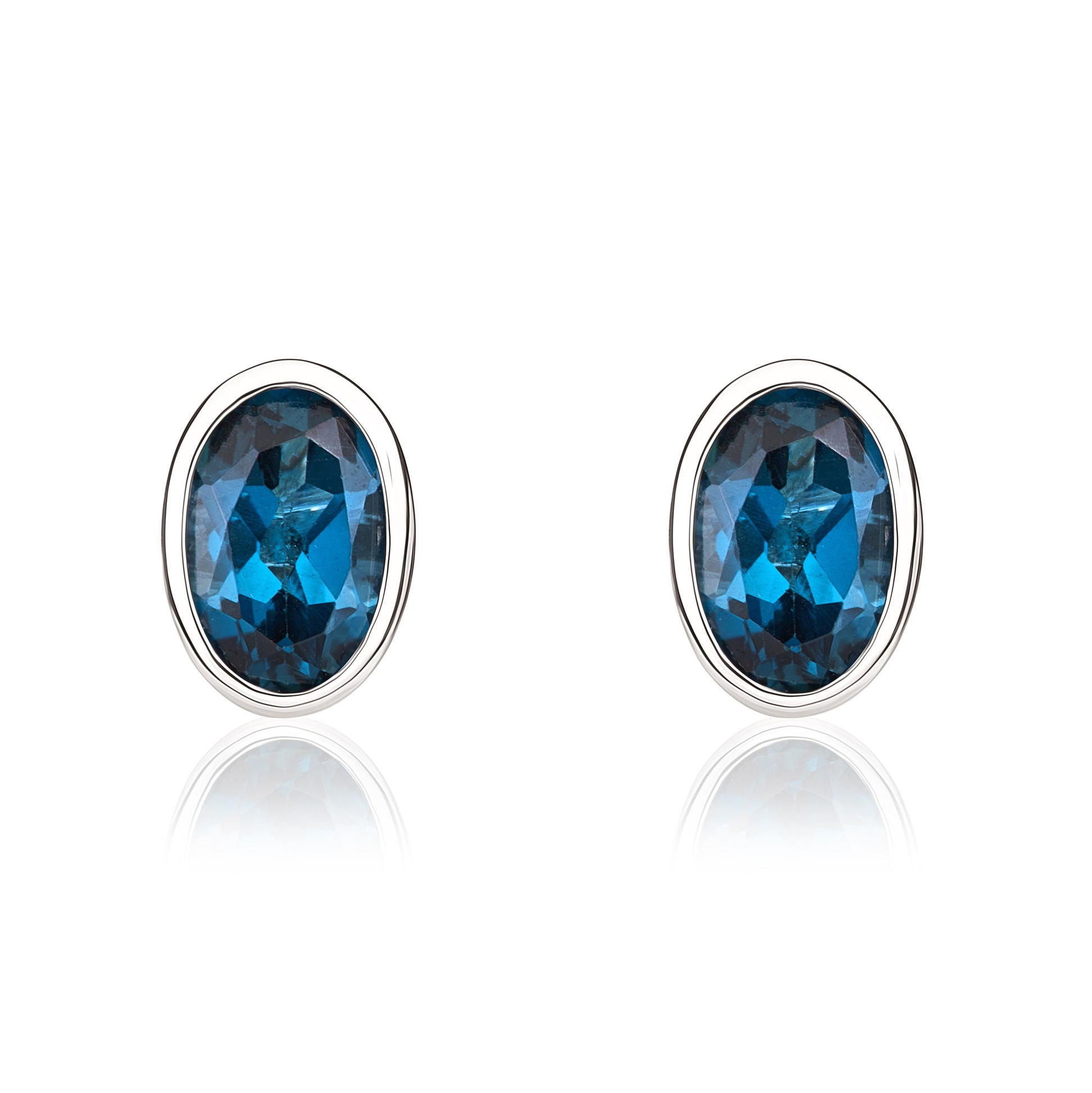 9ct white gold 6 x 4 mm oval London Blue Topaz rubover Stud Earrings