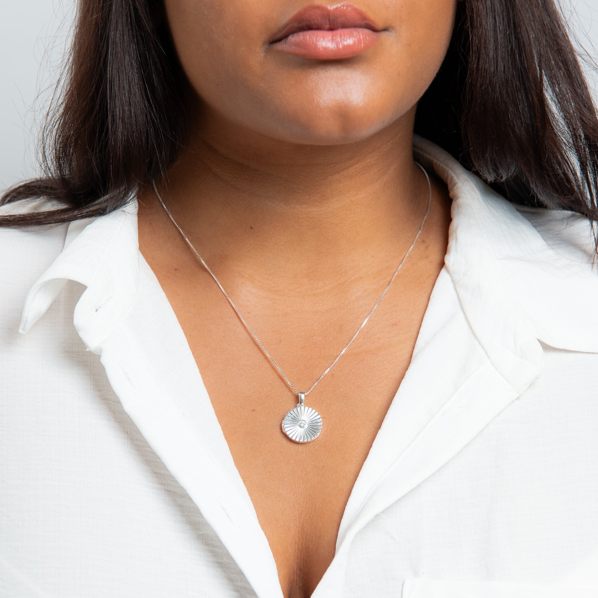 Starburst Cubic Zirconia Round Locket Pendant