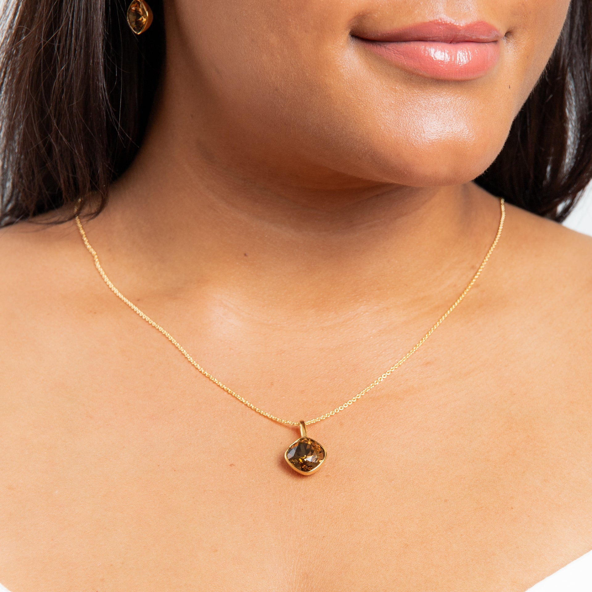 Cushion cut Preciosa Smoked Topaz with Yellow Gold Plating Elongated Bale Pendant