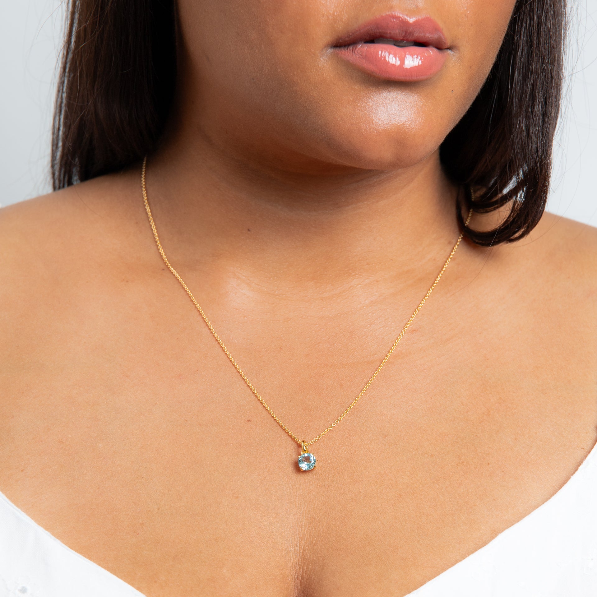 Round Semi Precious Blue Topaz with Yellow Gold Plating Dangling Pendant