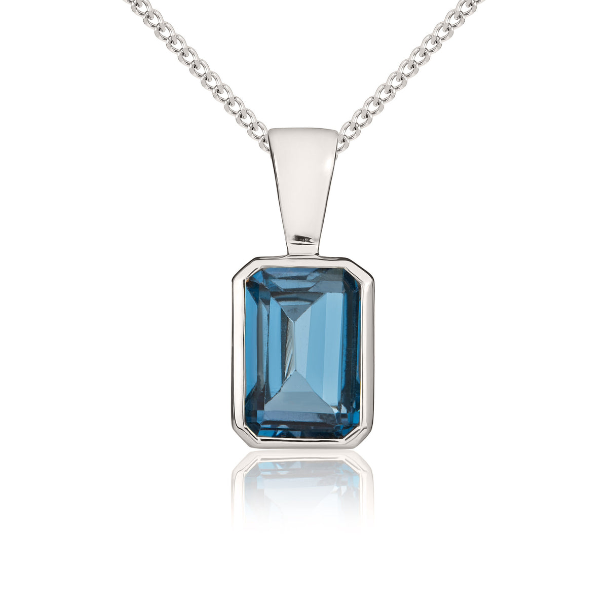 9ct White Gold 7x5mm Octagon London Blue Topaz Rubover Pendant