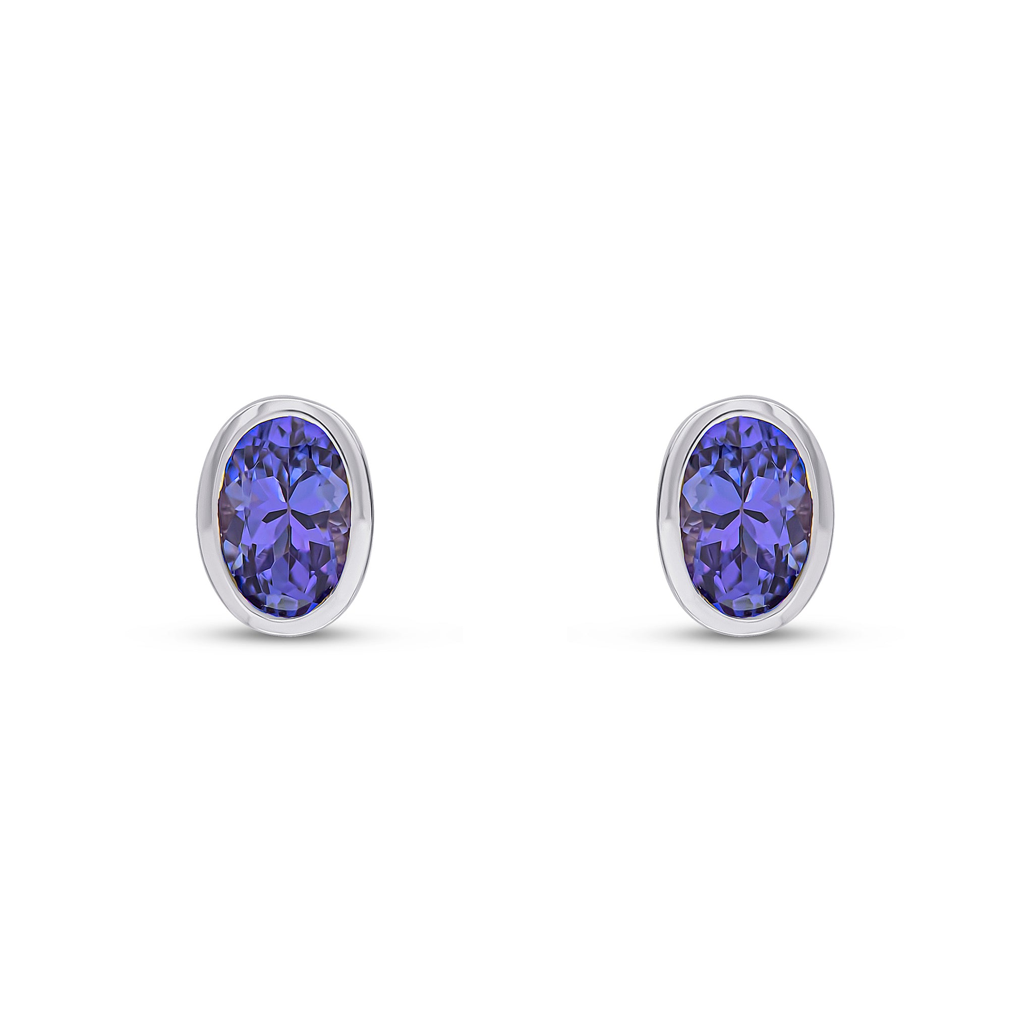 9ct White Gold 6x4 Oval Tanzanite Rubover Stud Earrings