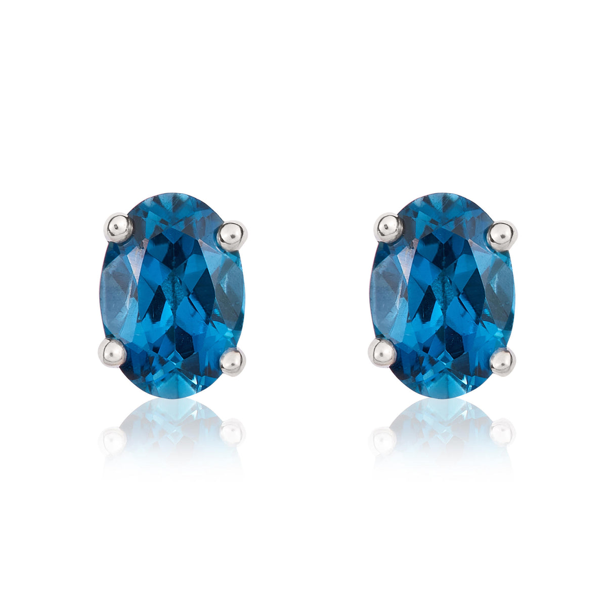 9ct White Gold 7x5 Oval London Blue Topaz Claw Stud Earrings