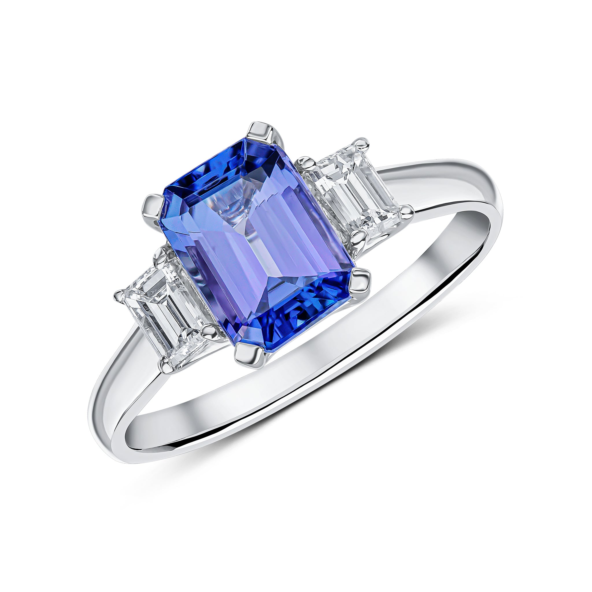 18ct White Gold 8x6 Octagon Tanzanite and Baguette Diamond Claw Set 3 Stone Ring