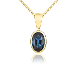 9ct yellow gold 6 x 4 mm oval London Blue Topaz rubover pendant