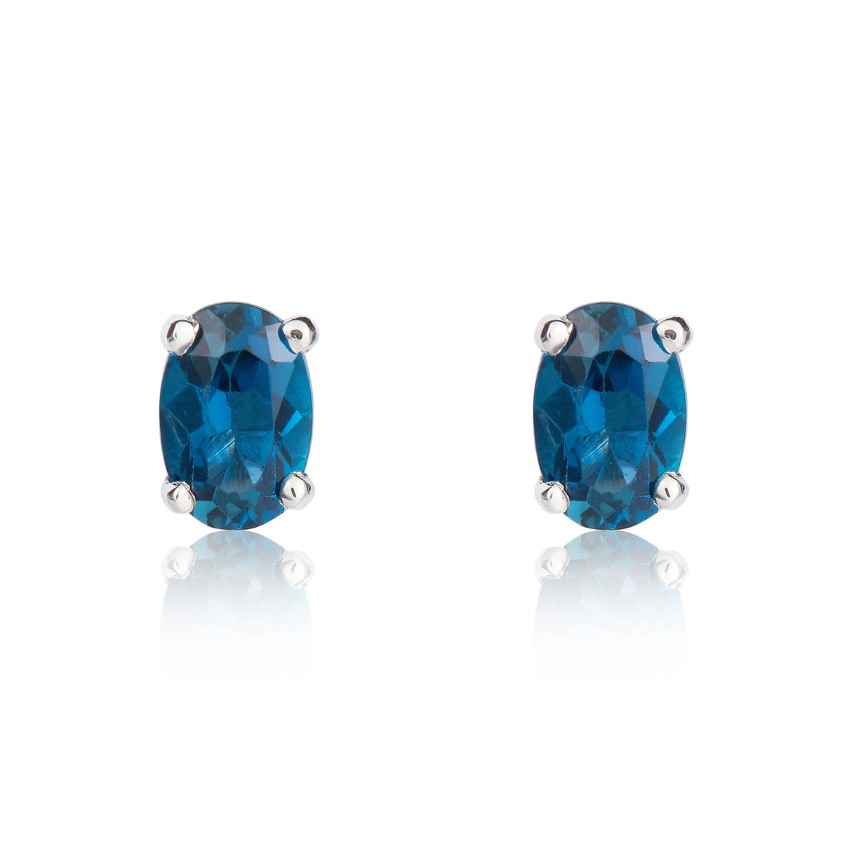9ct White Gold 6x4 Oval London Blue Topaz Claw Set Earrings