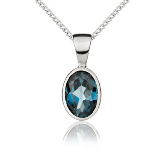 9ct white gold 7mm x 5mm Oval London Blue Topaz Rubover Pendant