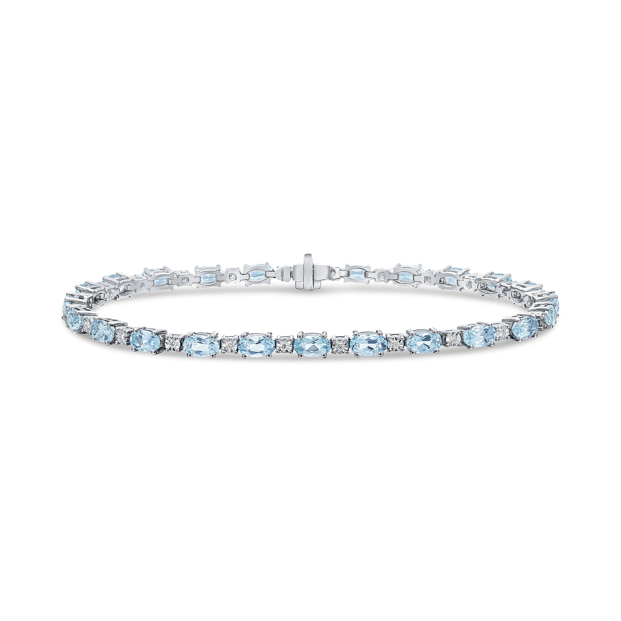 18ct White Gold Claw Set Oval Aquamarine and White Gold Illusion Set Diamond Line Bracelet