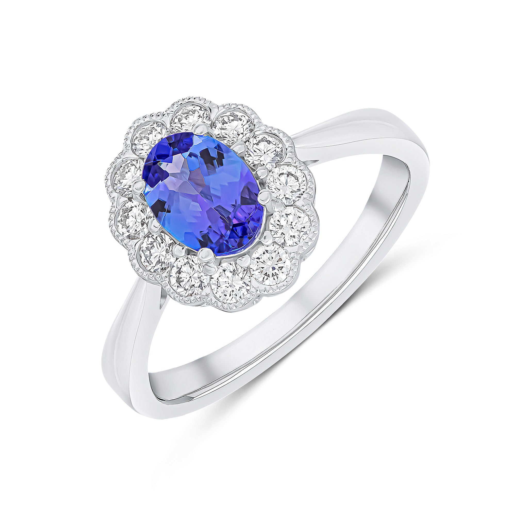 18ct White Gold 7x5 Claw Set Oval Tanzanite and Milgrain Round Diamond Cluster Ring