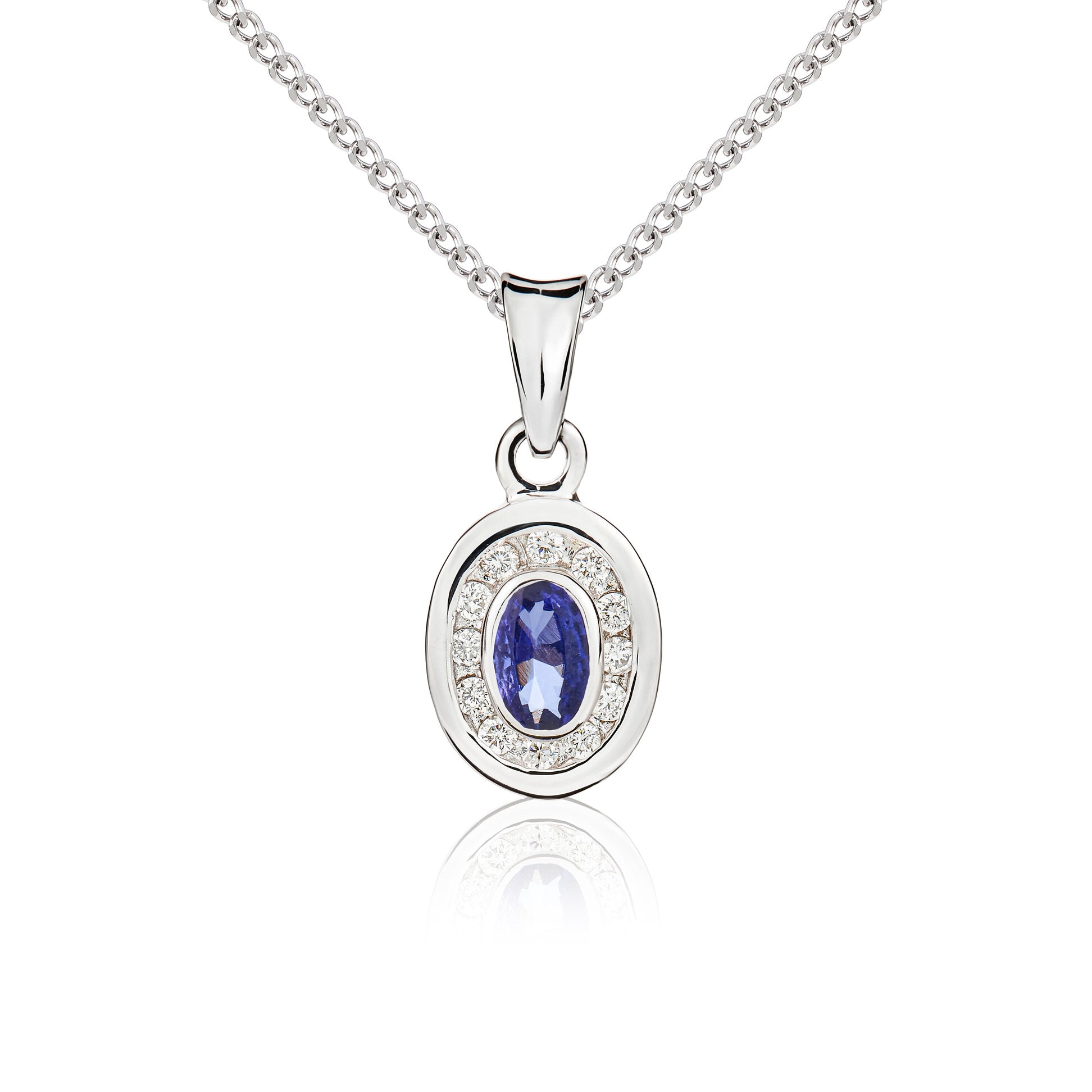 9ct white gold oval 5 x 3mm Tanzanite & diamond cluster rubover pendant