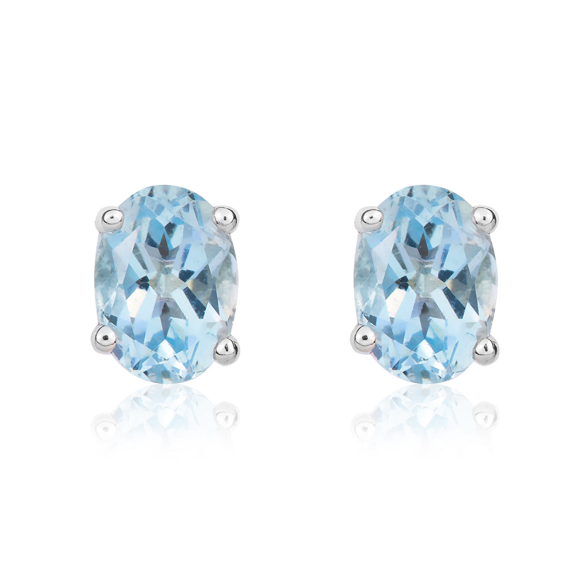 9ct White Gold 7x5mm Oval Aquamarine Claw Earrings